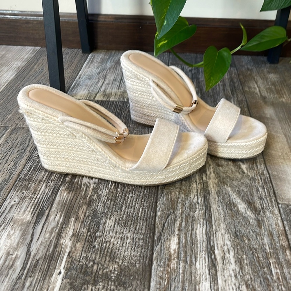 Women’s size 9 slip on wedge with gold accents on strap